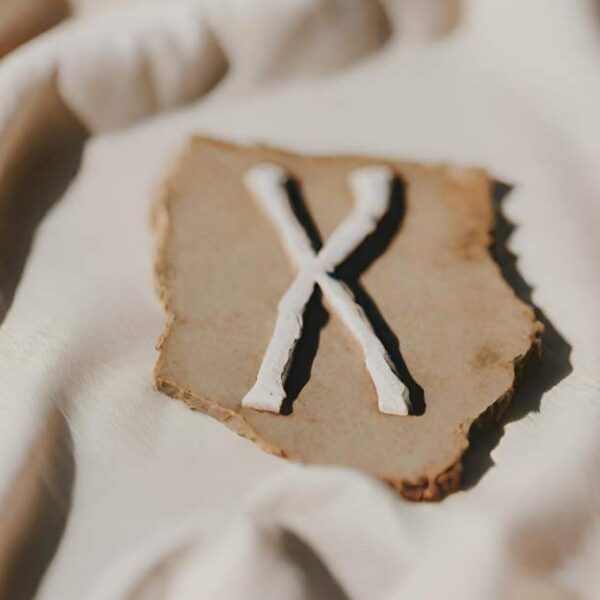 The letter x on a piece of cloth.